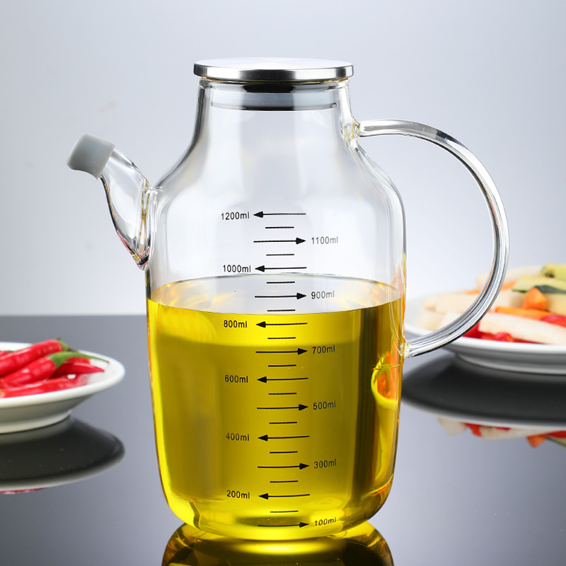 Er glassoljeflasken lett å rengjøre?