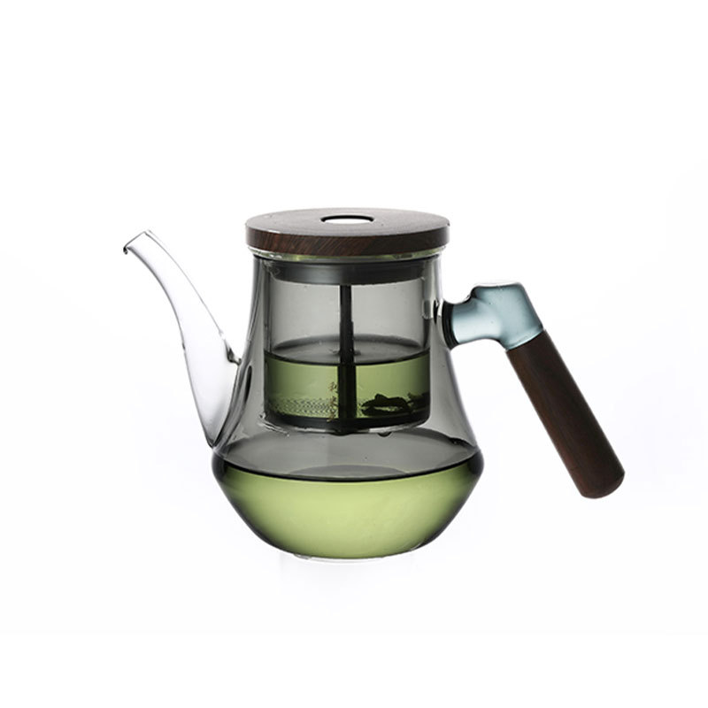 Tekanne av glass med te-vann-separator og filter for hjemmebruk